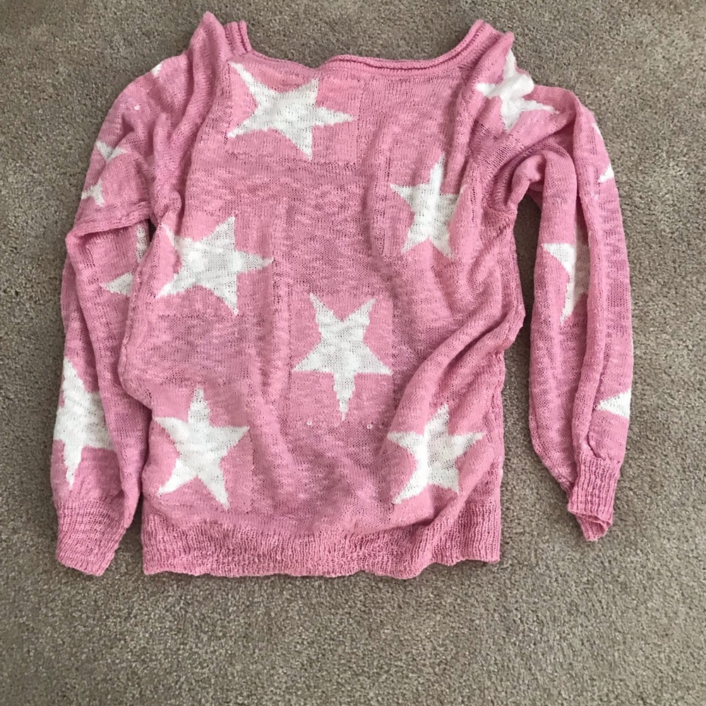 Pink sweater with white stars